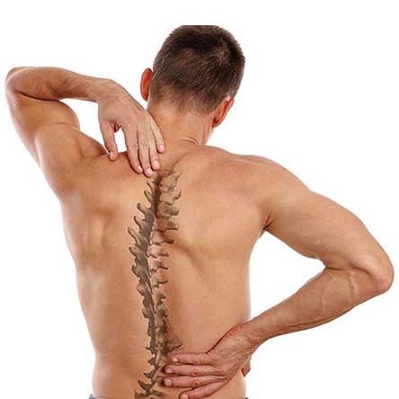 man with back muscle pain in need of chiropractor services